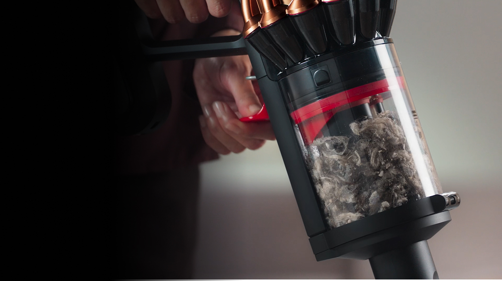 The CleanCompaktor bin on the Dyson V16 Piston Animal vacuum.