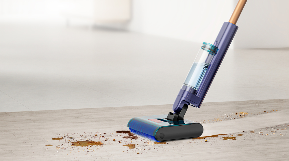 The Dyson Clean+Wash Hygiene Hard Floor Cleaner cleans spill from a hard floor.